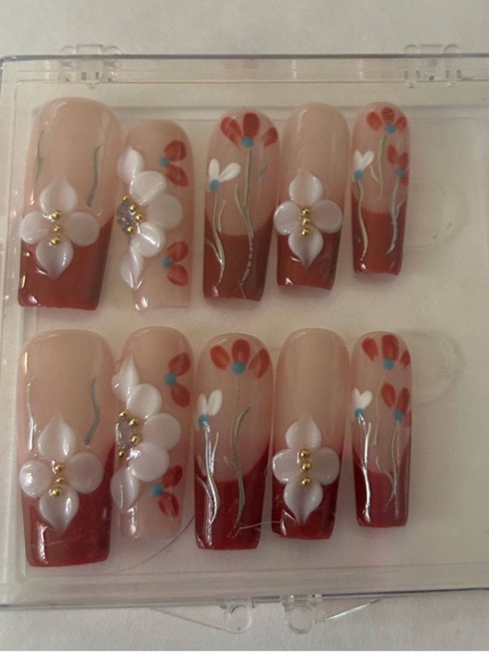 Hand-Painted Floral Press-On Nails in Nude & Rust